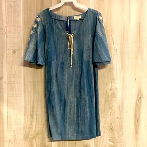 Umgee denim dress. Draw string detail and embroidered stars on full sleeves